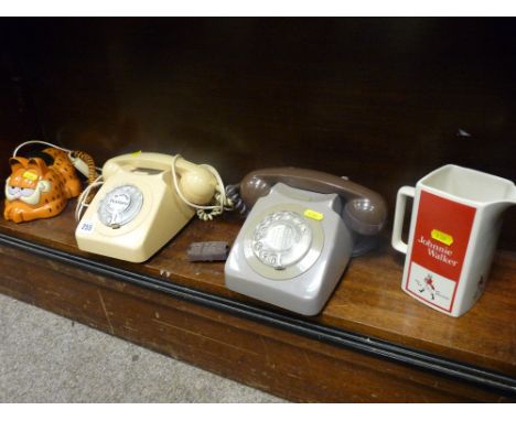 Two vintage telephones, a Garfield Cat telephone and a Wade Johnnie Walker whisky water jug
