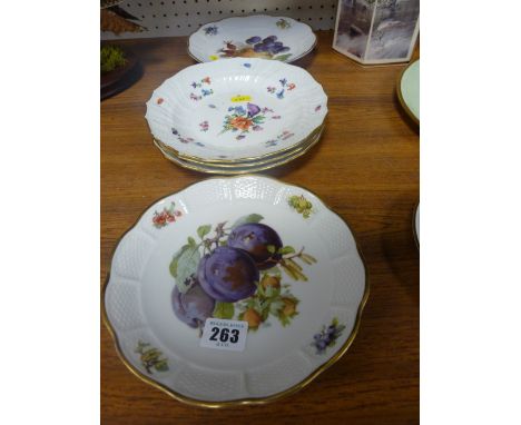 Three floral and insect decorated plates with blue cross sword marks and two Rosenthal fruit decorated plates
