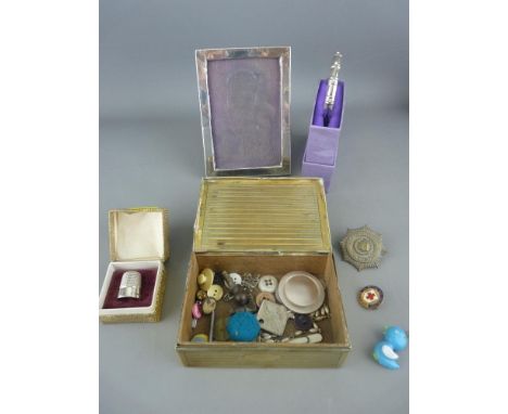 Hallmarked silver portrait frame and a thimble, a vintage cigarette box of badges and buttons etc