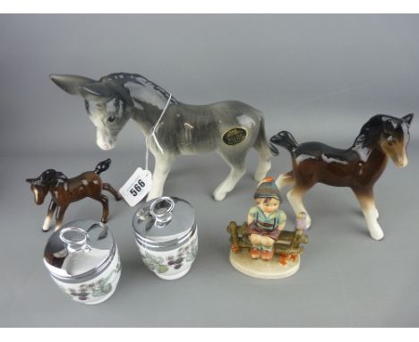 Bretby model of a donkey and two figures of foals (other makers), a Hummel figurine of a young boy on a fence and a boxed pai