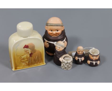 A Royal Doulton china flask, together with three Goebel figures, 'Monks', and a Goebel Monk character jug  