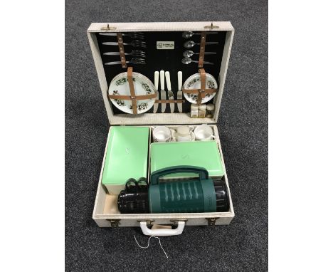 A cased Sirram picnic set