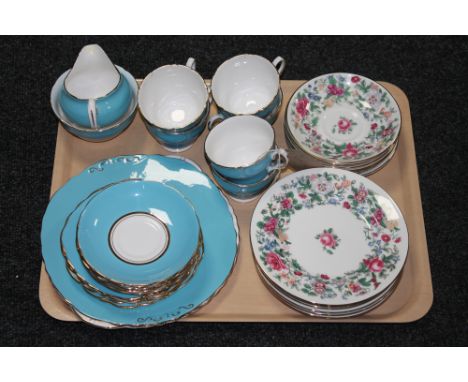 A tray containing a twenty two piece Colclough china tea service, together with twelve Crown Staffordshire tea plates