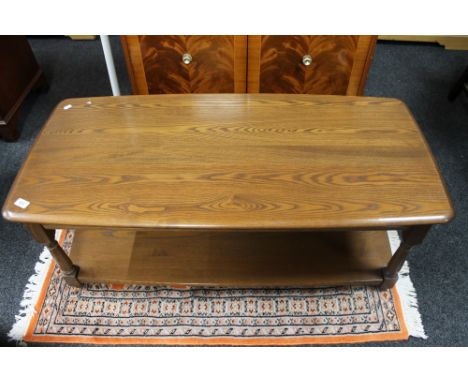 An Ercol dark elm coffee table 