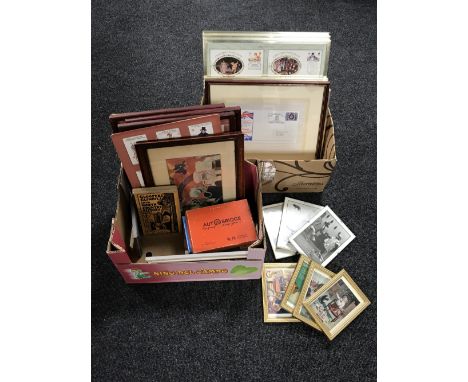 Two boxes containing framed first day covers, frame picture cards, small framed advertisements, framed needlework panel 'bles
