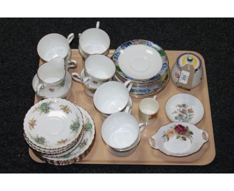 A tray containing nineteen pieces of Royal Stafford True Love tea china, together with twelve pieces of Minton blue mosaic te