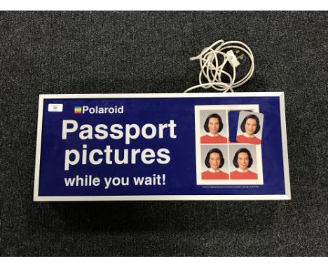 A vintage Polaroid Passport light box 