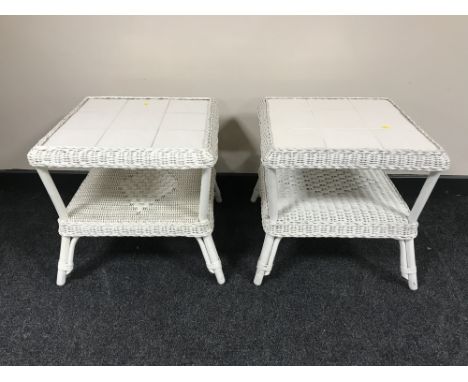 A pair of painted wicker two tier tile topped tables 