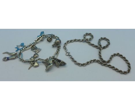 A silver and white metal charm bracelet and a .925 silver chain, 52.4g