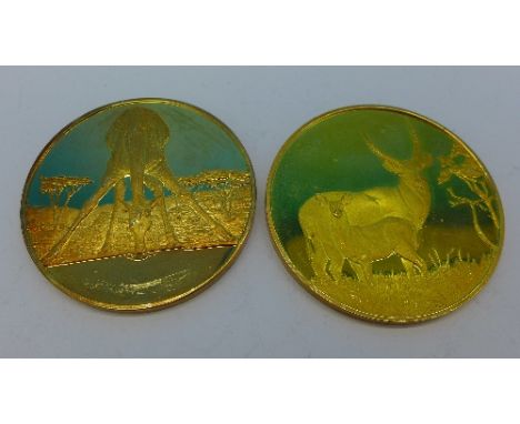 Two gilded sterling silver medallions, giraffe and springbok, 74g