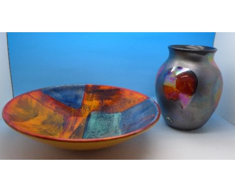 A Poole pottery dish and a Poole pottery vase, vase 16.5cm