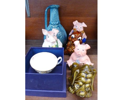 Three Wade Nat West pig money boxes, a Sadler jug, two Sylvac money boxes and a Royal Worcester commemorative cup and saucer