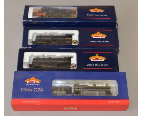 OO Gauge. 4 x Bachmann locomotives. BR black WD 2-8-0 Austerity No. 90015 E/Crest (missing internal packaging), LNER black WD