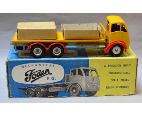 Shackleton Toy Mechanical Foden F. G. Vehicle in yellow over red. In Excellent condition, box F includes Maintenance instruct