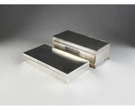 A silver mounted cigar box, Abrahams Brothers, Birmingham 1929, of elongated rectangular form with engine turned decoration a