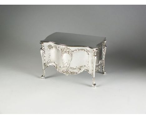 An Edwardian novelty silver mounted jewellery box in the form of a commode, William Comyns & Sons, London 1902, the textured 