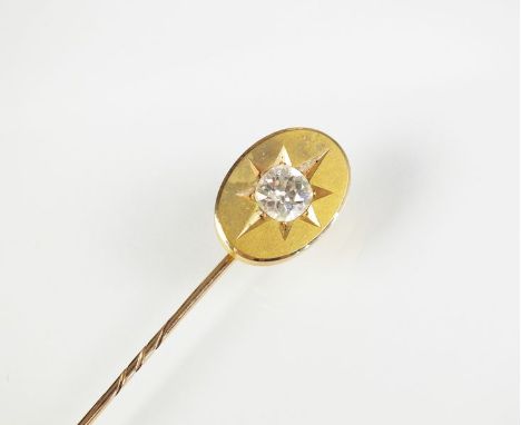 A single stone diamond set stick pin, the old cut diamond claw set within star cut border, not stamped, weight approx 4.4g