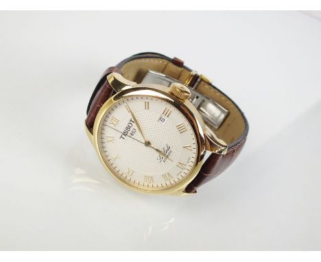 A Gentleman's Tissot gold plated automatic Le Locle wristwatch, the white textured dial with Roman numerals and date aperture