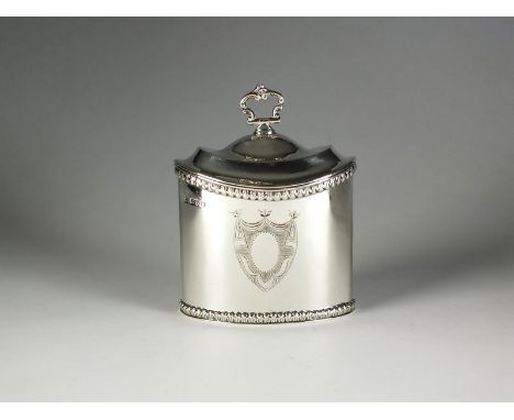 An Edwardian silver tea caddy, George Nathan & Ridley Hayes, Chester 1907, of oval form with engraved shield to the body, gad