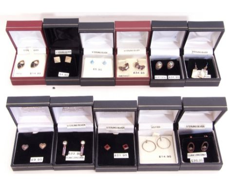 Mixed Lot: eleven pairs of white metal earrings, blue topaz, mother of pearl, amethyst examples etc