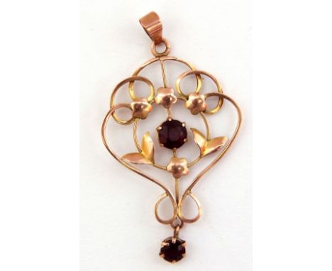 Yellow metal open work pendant centring a circular faceted amethyst with smaller matching dropper beneath, (unmarked), 1.8gms