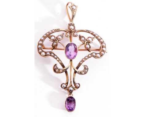 Amethyst and seed pearl openwork pendant centring an oval faceted amethyst in a cut down bezel and millegrain setting with sm