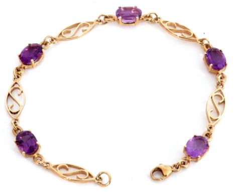 Modern 375 stamped amethyst bracelet featuring five oval faceted amethysts in cut down settings joined by pierced S-shaped li