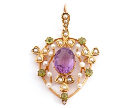 Amethyst, peridot and seed pearl open work pendant centring an oval multi-claw set faceted amethyst within a seed pearl and p