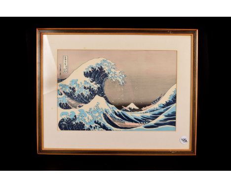 A Japanese silk painting, together with a later print of Hokusai's 'The Great Wave off Kanagawa', both framed and glazed