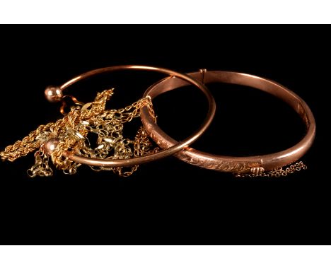 Five 9ct gold and yellow metal items of jewellery, including a torsion bangle, a bangle, a rope twist bracelet, a flattened l