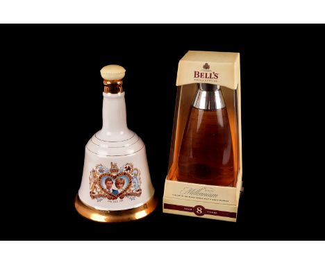 A Bells Extra Special 2000 Millennium decanter, together with bell shaped decanters commemorating the birth of Prince William