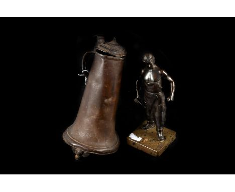Two spelter blacksmith figures, together with three tall pewter water jugs, AF (5)
One of the jugs is missing the finial, and