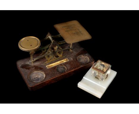 A late 19th century set of postal scales, with a set of brass weights, together with a hardstone and glass mounted inkwell, a
