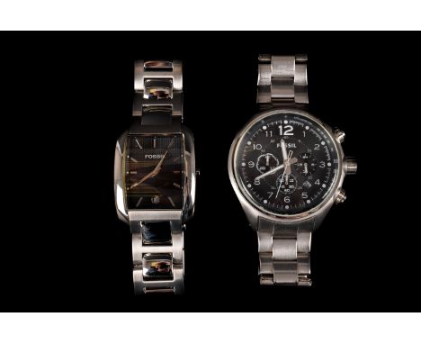 Two modern Fossil stainless steel gentlemen's wristwatches, one a chronograph, the other with black dial and date aperture, o