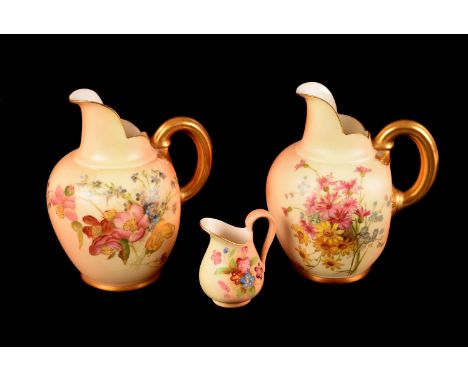 A pair of Royal Worcester Blush Ivory ewers, both marked 1094 to base, one in red the other in green, together with a Royal W