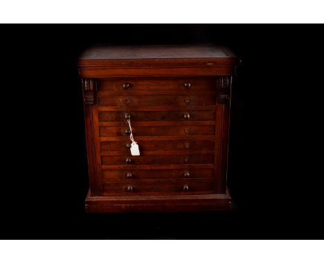 A mahogany collectors cabinet, with 8 drawers, each 3cm deep, height 51.5cm some bobbin handles missing AF