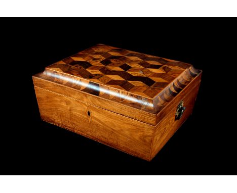 A 19th century inlaid wooden box, having optical illusion style design to top, opens to reveal a lift out shelf, fitted with 