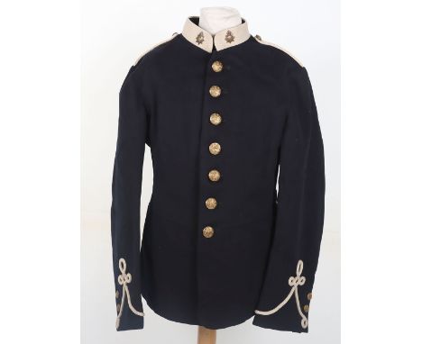 1913 British Army Service Corps Other Ranks Tunic, blue cloth with white collar and cuffs, brass other ranks collar badges an