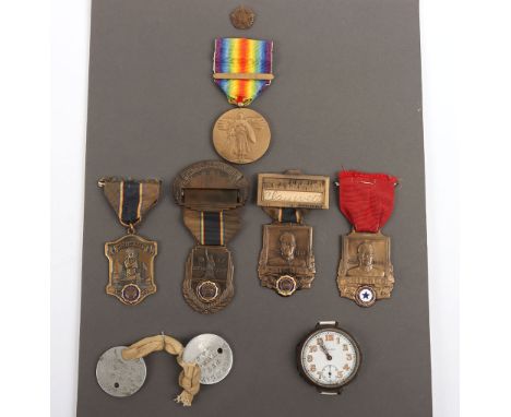 WW1 American Medal Grouping, a very complete collection of the medals, dog tags, wristwatch worn in the trenches, demob star,