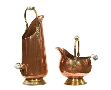 A mid 20th century coal scuttle and coal helmet, both with blue and white ceramic handles, coal scuttle height 57 cm.