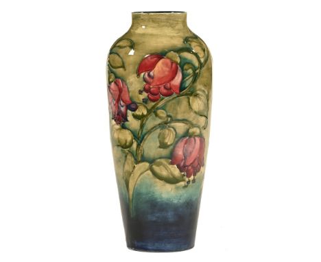 William Moorcroft, a Fuschia patterned vase with painted signature WM to the base, also with impressed mark W Moorcroft potte