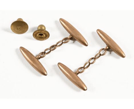 A pair of 9 ct gold bullet shaped cufflinks, and two 9 ct gold studs.&nbsp;&nbsp;The weight is +/- 7.7 grams.
