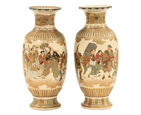 A pair of Meiji period Japanese satsuma ware vases, decorated with figures, rectangular seal mark to base. Height 30 cm.The f