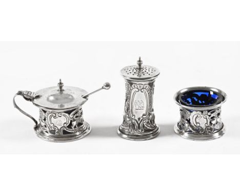 An Irish silver condiment set, marked to underside Sharman D Neill Ltd Belfast 1911. Overall weight 104 grams.The pepperette 