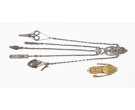 A silver chatelaine, hallmarked  London 1889 makers mark WC with a pair of scissors, silver whistle, propelling pencil in for