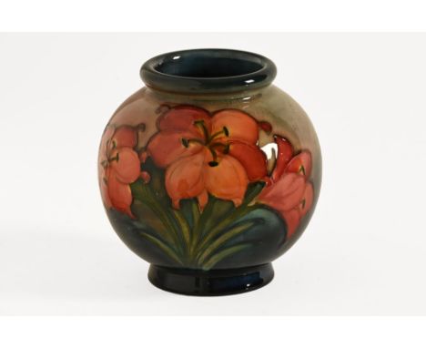 Moorcroft flambe Freesia vase, with signature to base and impressed Moorcroft and Made in England. Height 13 cm.The vase is i