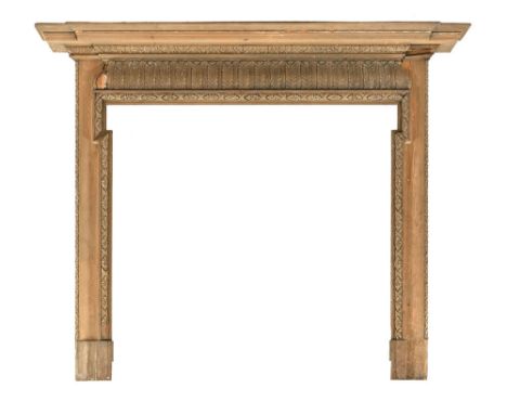 A Georgian style pine and gesso fire surround, the mantel with breakfront decoration.  Height 138 cm, width 168 cm, depth 24 