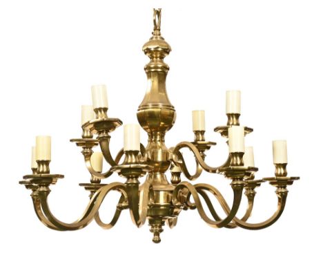 A brass ceiling light fitting, with twelve branches.  Height +/- 60 cm, diameter +/- 72 cm.