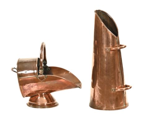 A Victorian heavy gauge copper coal scuttle, with two handles. Height 60.5 cm, together with a coal helmet.The base has been 