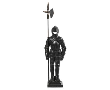 A 20th century alloy fireside figure of a knight.  Height to top of the helmet 65 cm, base width 17 cm, depth 16.5 cm.